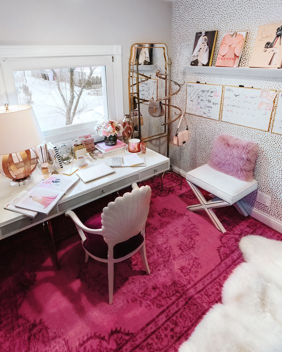 a bold glam home office with a lavender pillow a hot pink rug some pink accessories and touches