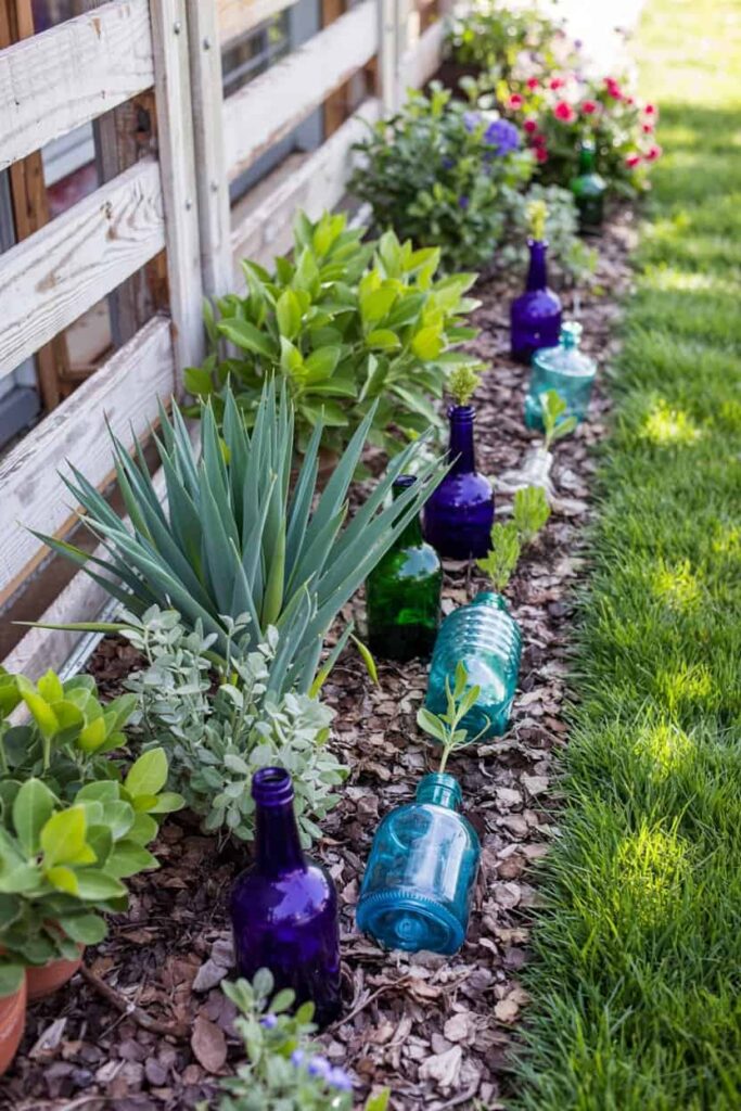 small lawn border collect glass bottles 1